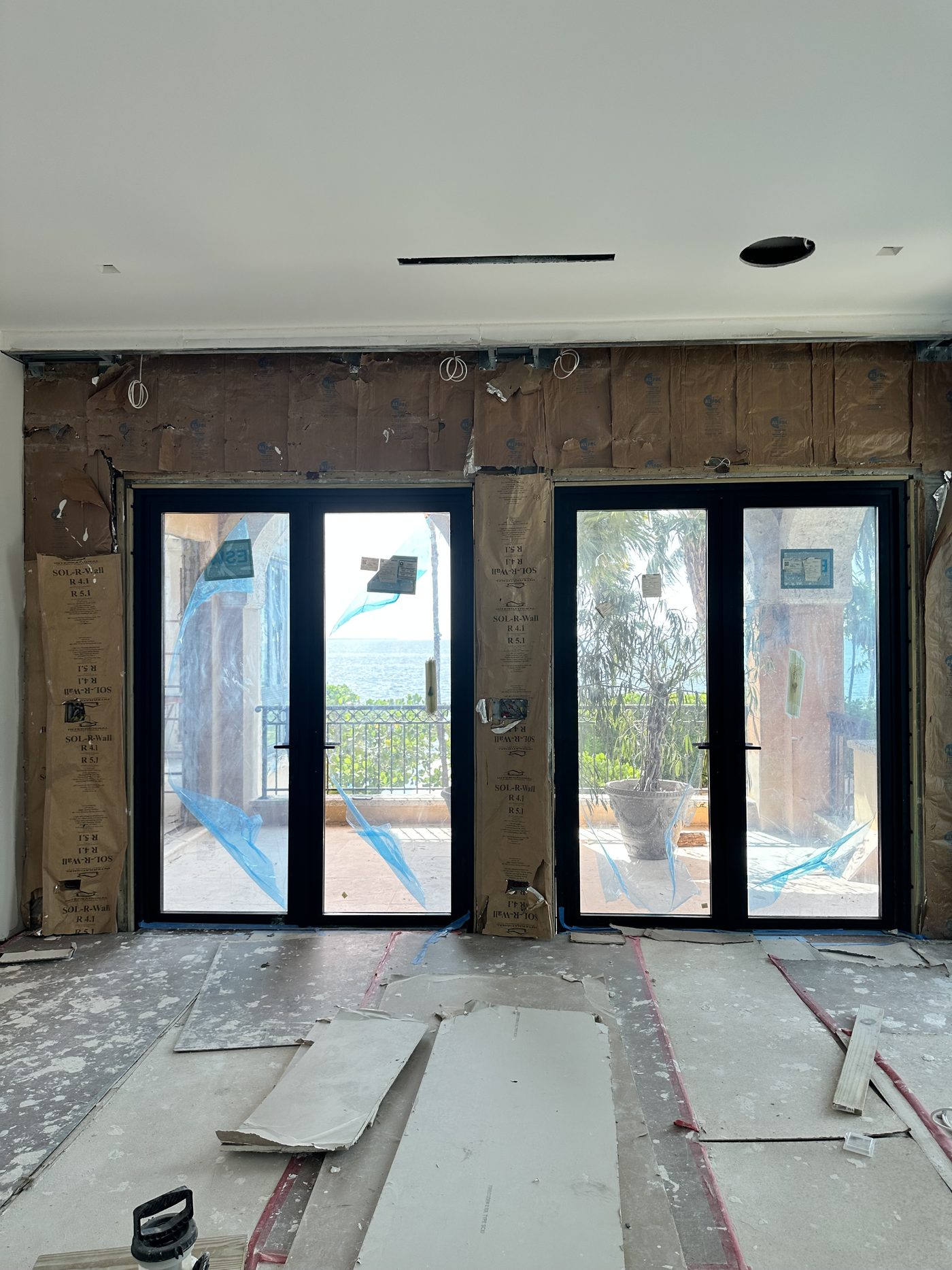 Pair of impact French doors opening to the bay terrace