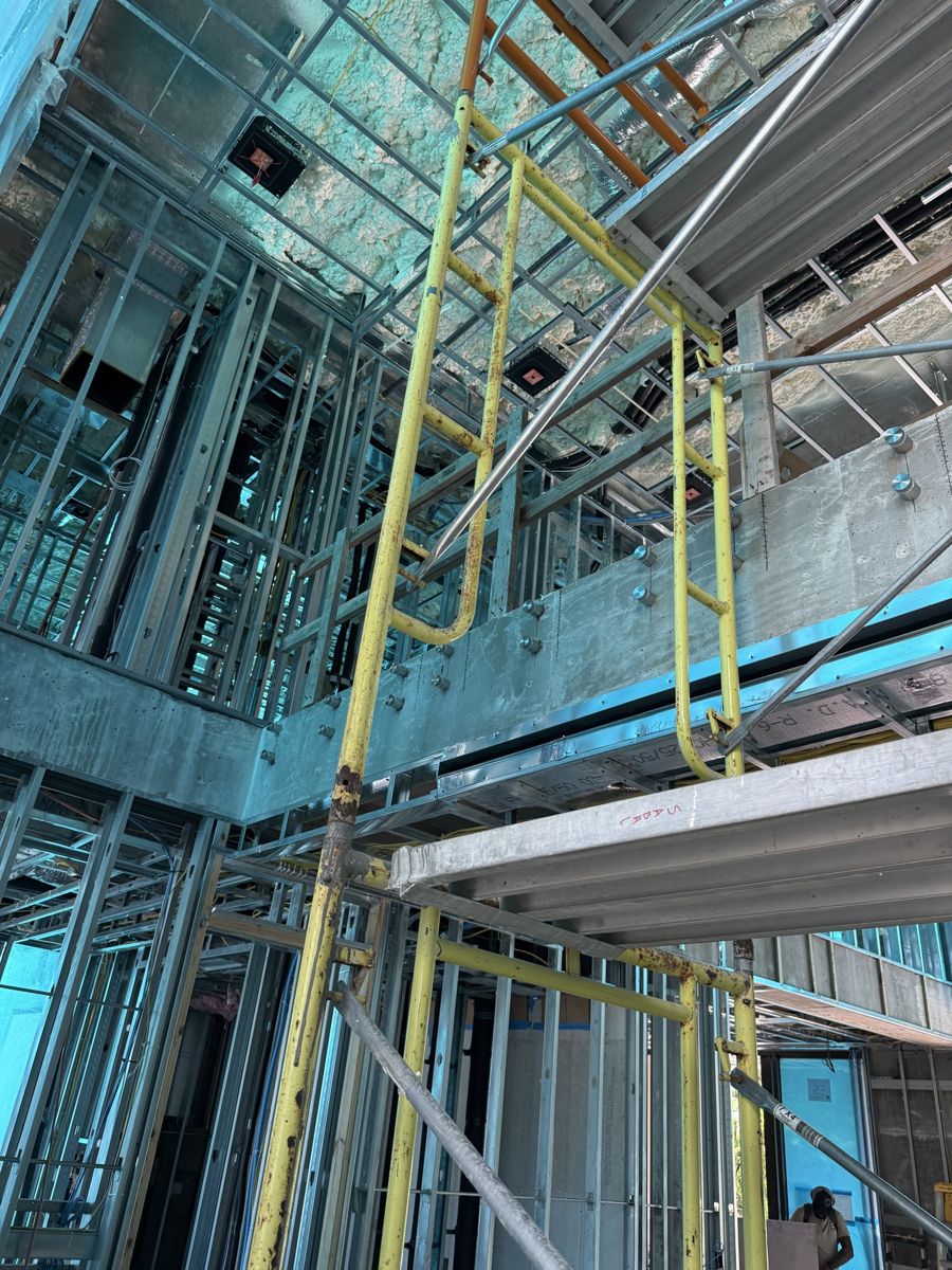 Standoffs lined up along an atrium slab edge