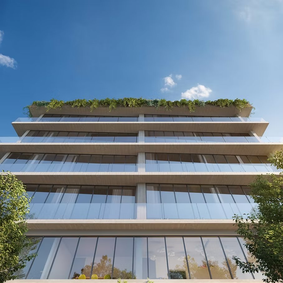 Rendering: looking up at the stacked balconies and glass railings
