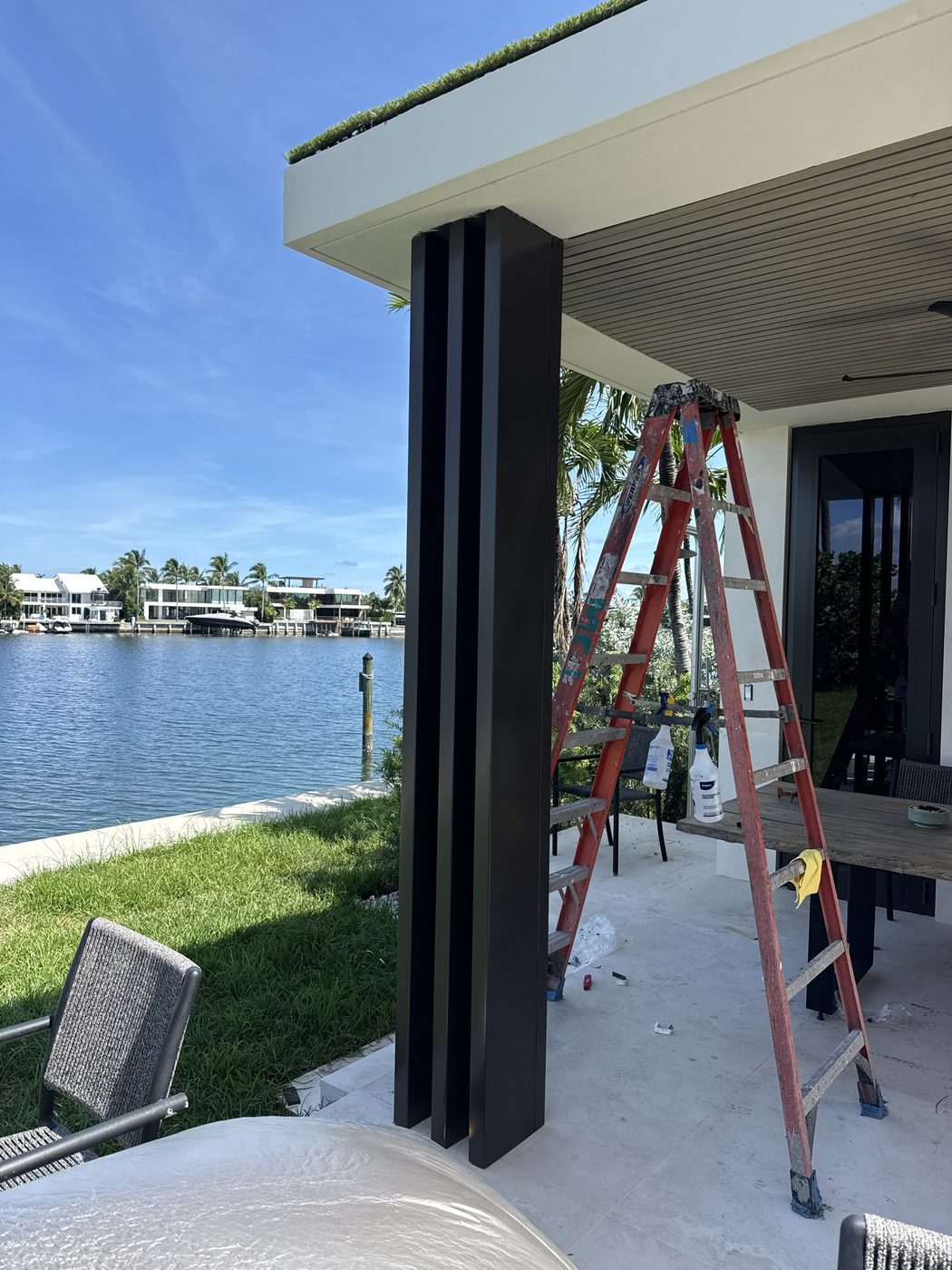 Break metal column covers going on at the waterfront loggia