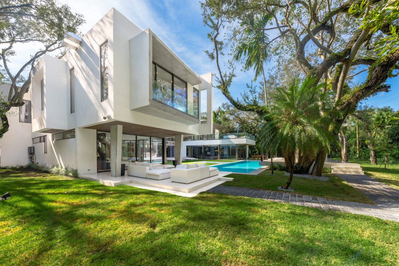Rear elevation with cantilevered glass box and pool